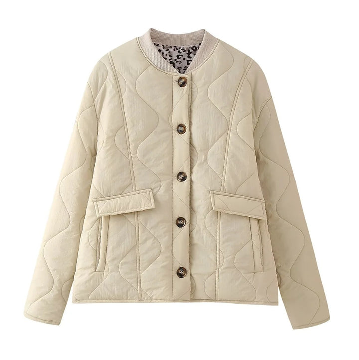 Quilted transitional jacket for women with practical pockets and round collar Lune London