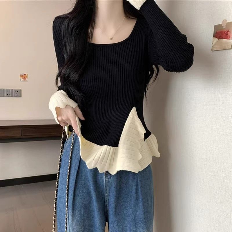 Pull en tricot côtelé à la mode pour femmes avec ourlet asymétrique Chic & Stil