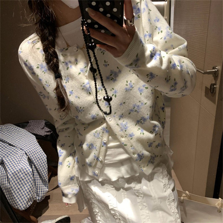 Cardigan féminin avec design floral et fermeture à boutons classique Chic & Stil