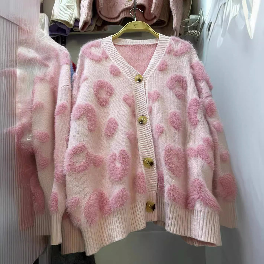 Sweater vest for women in cozy knit with heart shape design and button detail Lune London