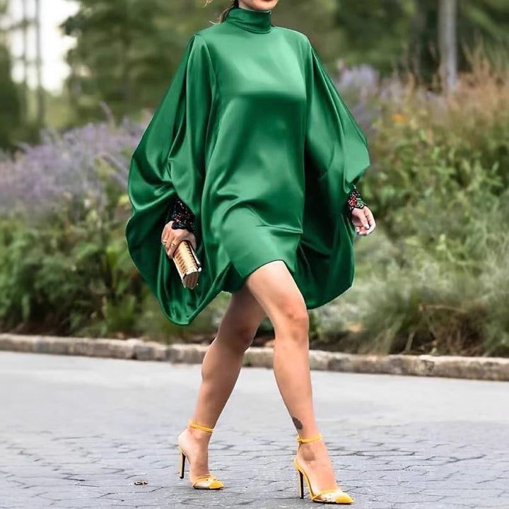 Oversized mini dress for women with voluminous sleeves and an elegant high collar Lune London