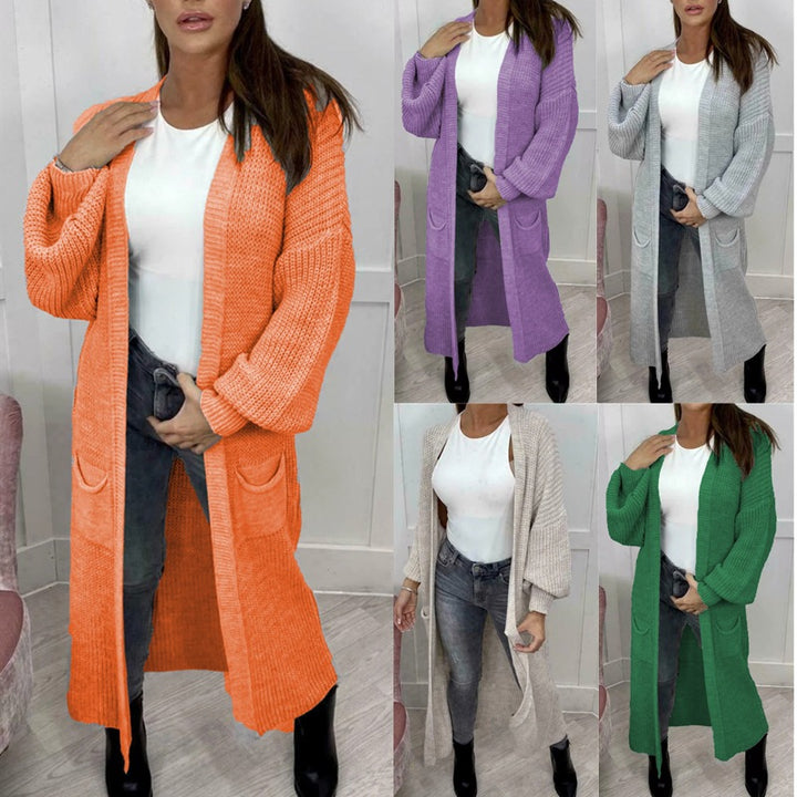 Ladies Long knitted cardigan with a textured knit look and practical pockets Lune London