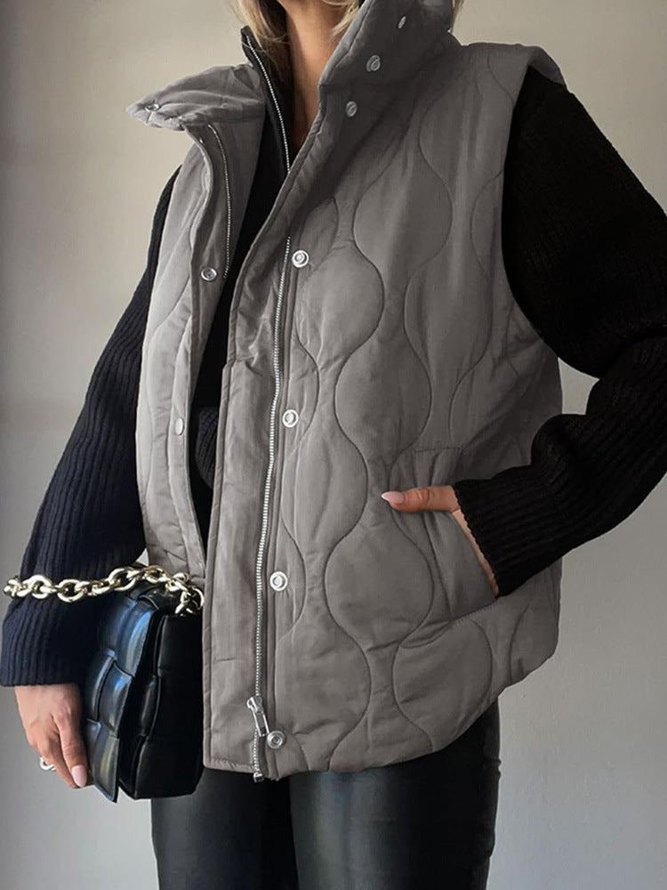 Quilted vest for women with high collar and practical pockets Lune London