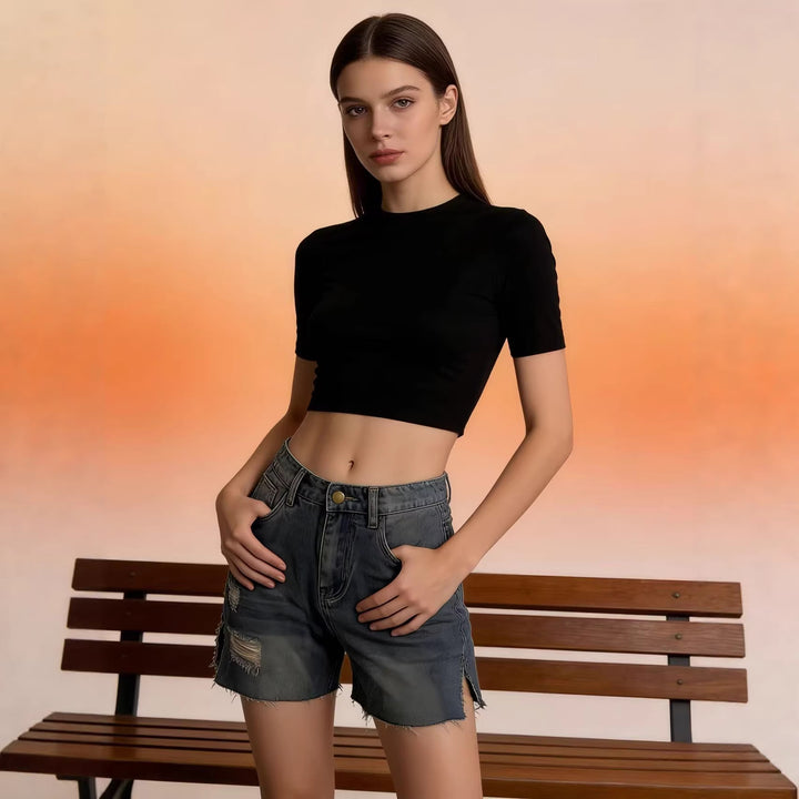 Women's casual denim shorts with frayed hems and side slit Lune London