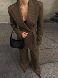 Elegant two-piece suit set for women with double button closure and wide leg Lune London