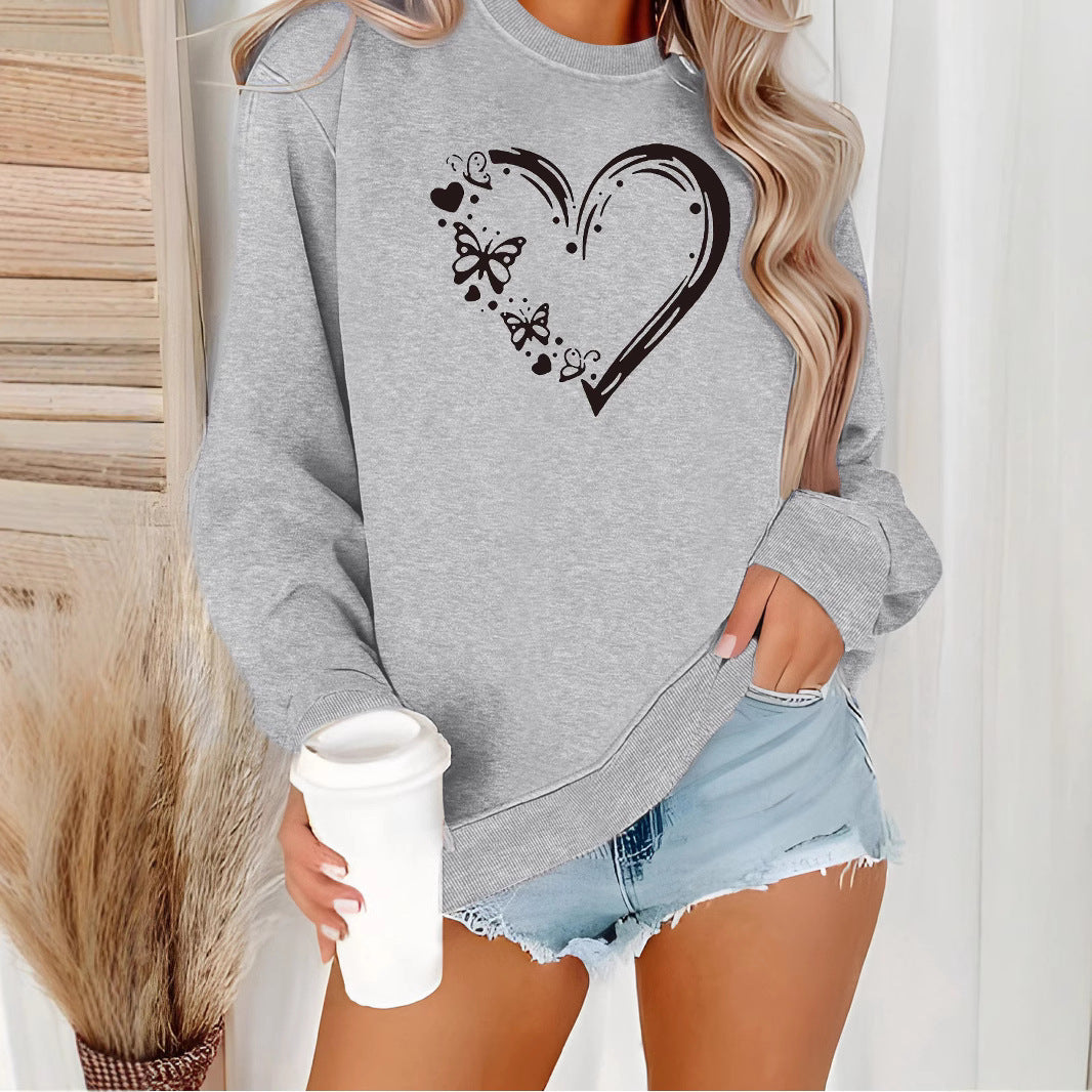 Sweat-shirt pour femmes avec un design créatif de cœur et de papillon Chic & Stil