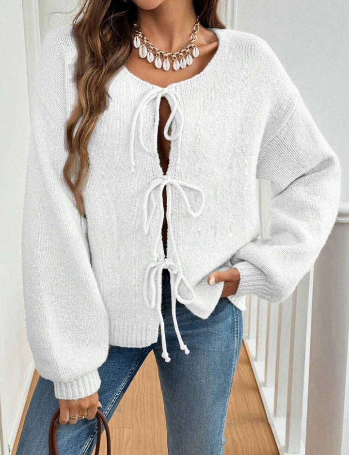 Women's knit sweater with a decorative lace-up design and casual balloon sleeves Lune London
