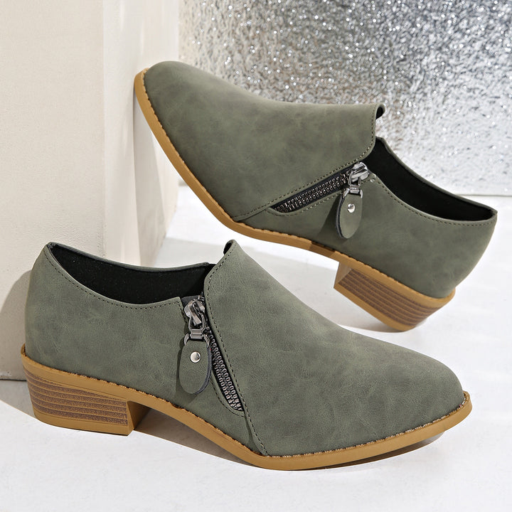 Women’s biker ankle boots with trendy zipper and comfortable sole Lune London