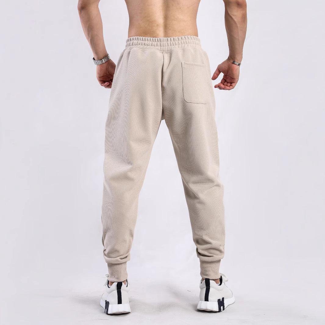Men's sporty jogger pants with breathable inserts and elastic waistband Lune London