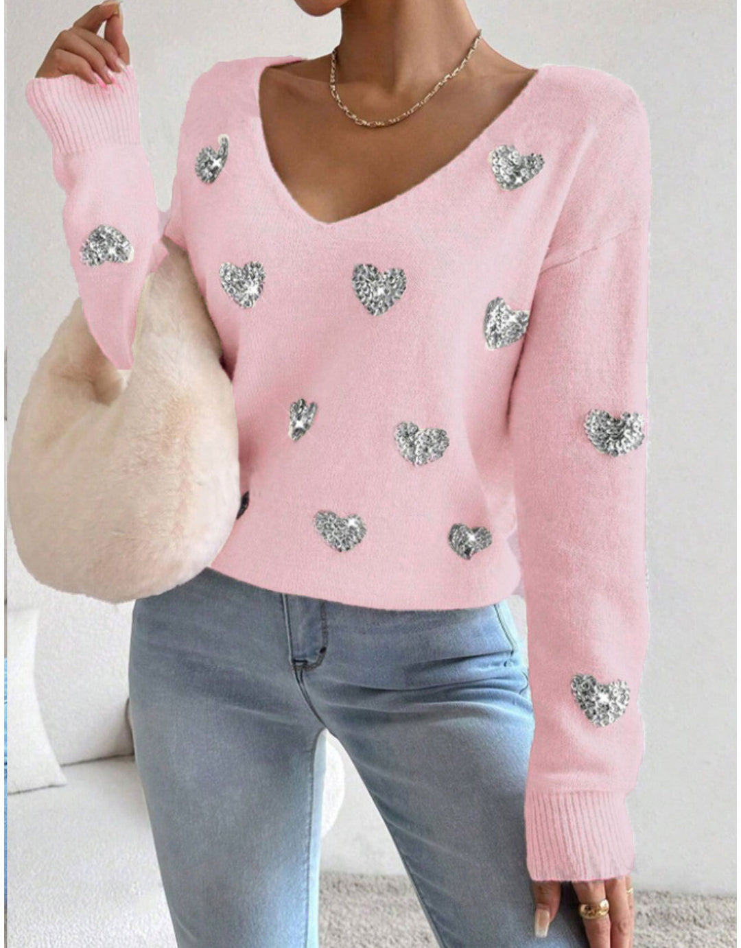 Pull surdimensionné pour femmes avec décolleté en V profond et motif cœur Chic & Stil