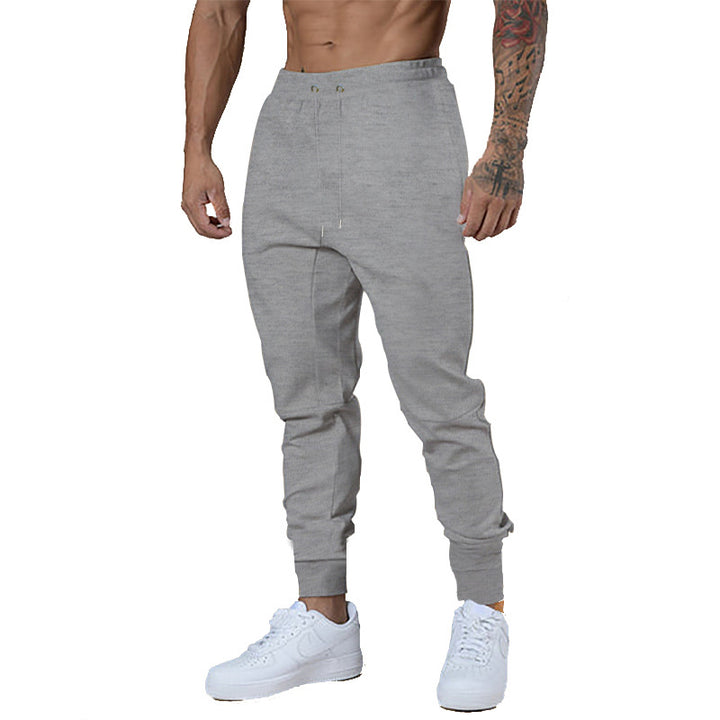 Men's sporty jogger pants with elastic waistband and practical zip pockets Lune London