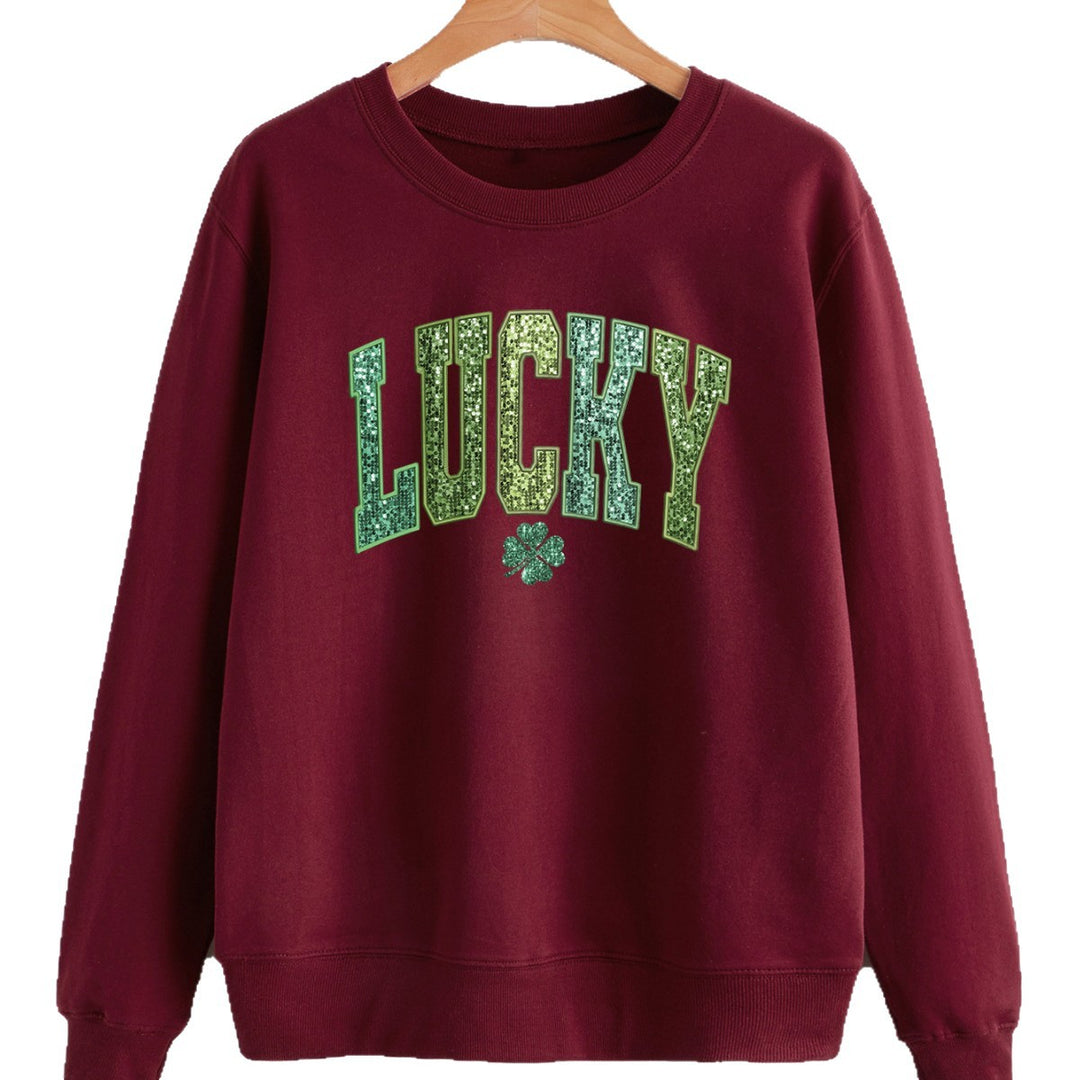 Sweatshirt décontracté pour femmes avec lettrage étincelant et motif de trèfle Chic & Stil