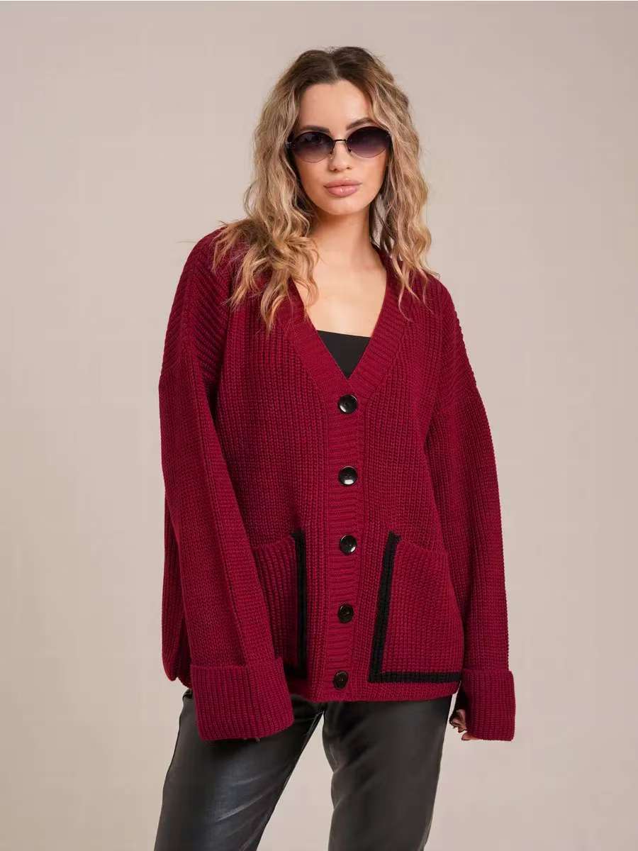 Ladies chunky knit cardigan with front openings and large buttons Lune London