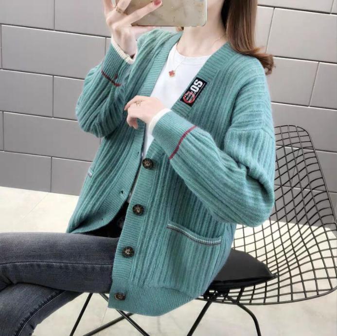 Cardigan for women with textured ribbed pattern and practical pockets Lune London