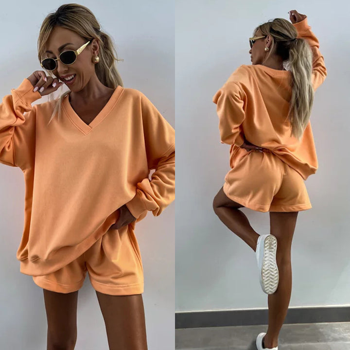 Casual outfit for women with oversized V-neck sweater and shorts Lune London