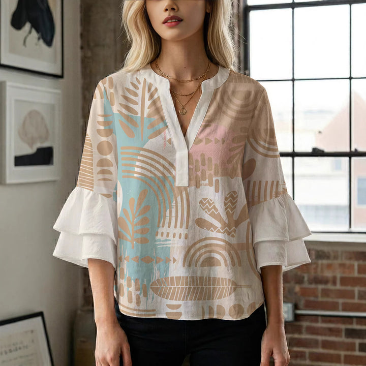 Women's blouse with ruffle details and eye-catching animal print Lune London