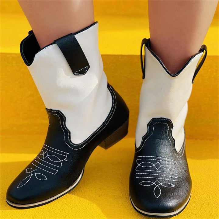 Women's cowboy boots with rich detail embroidery and a chic trendy cut.