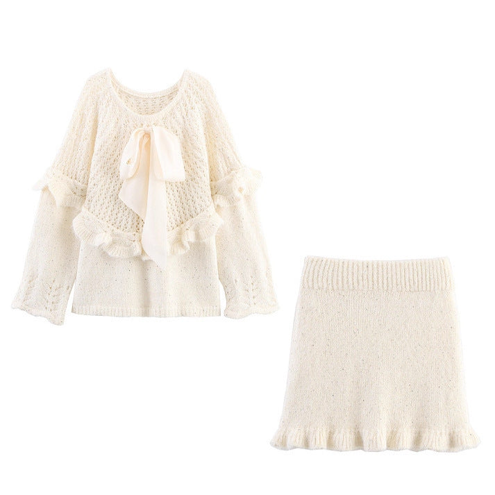 Elegant ladies knitted outfit with ruffles and bow accents Lune London