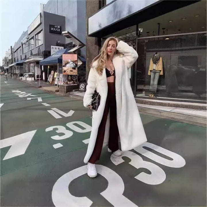 Oversized faux fur coat for women with hood and textured design Lune London