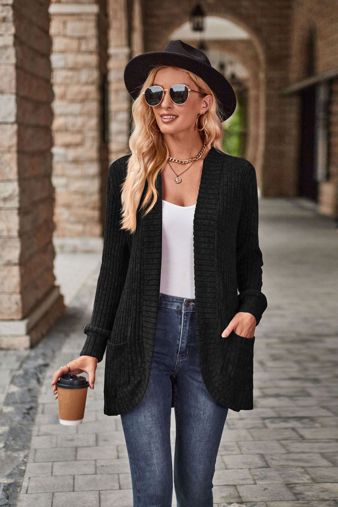 Knitted jacket for women with textured pattern and practical pockets Lune London
