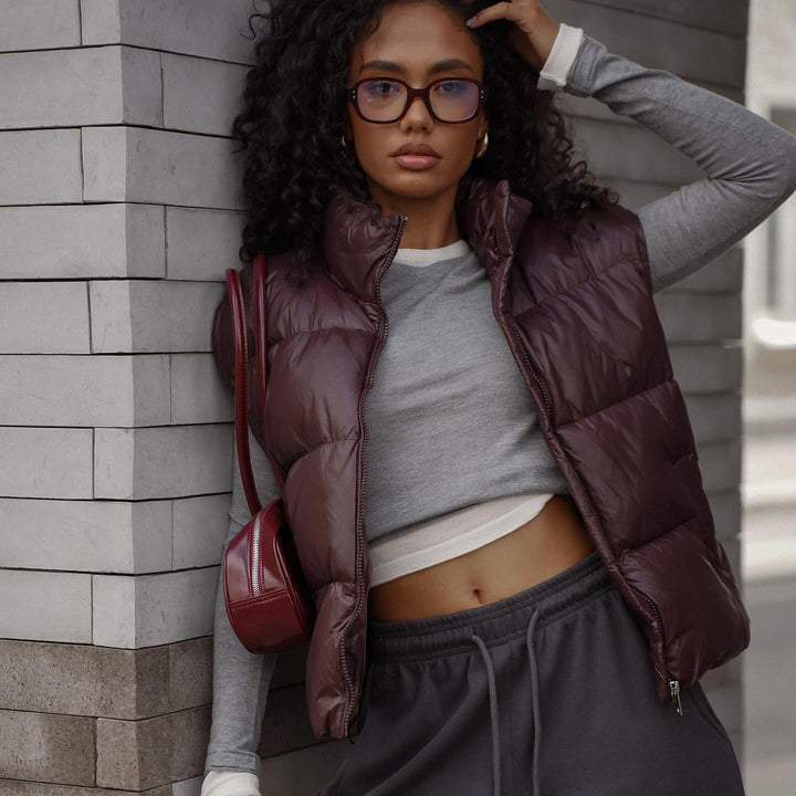 Quilted women's vest with high collar and practical zipper Lune London