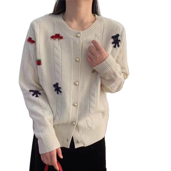 Cardigan en tricot confortable pour femmes avec un design ludique et des boutons pratiques Chic & Stil