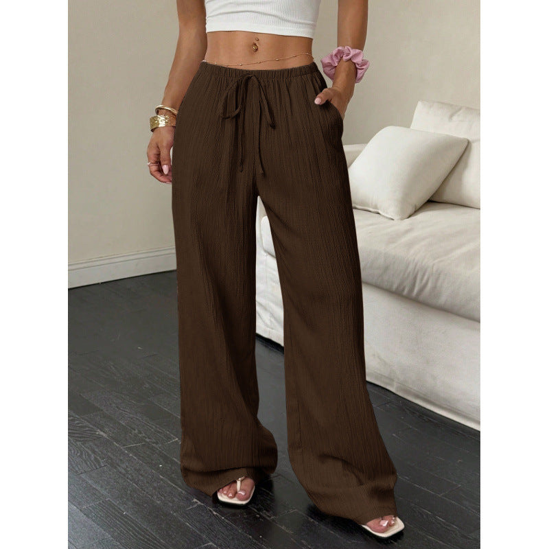 Casual and wide trousers for women with elastic waist and tie belt Lune London