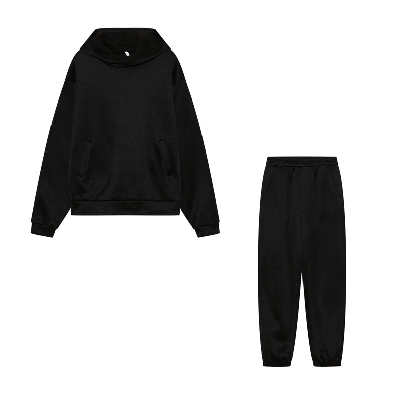 Ensemble de sweat à capuche sportif et de pantalon de jogging Chic & Stil pour femmes