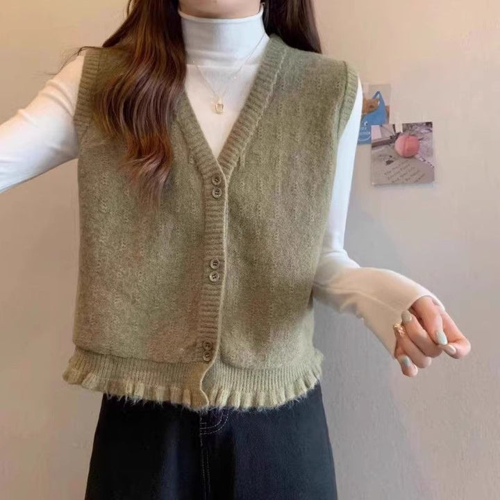 Gilet en tricot pour femme avec ourlet à volants ludiques Chic & Stil