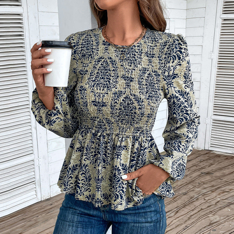 Elegant shirt for women with voluminous sleeves and a floral pattern Lune London