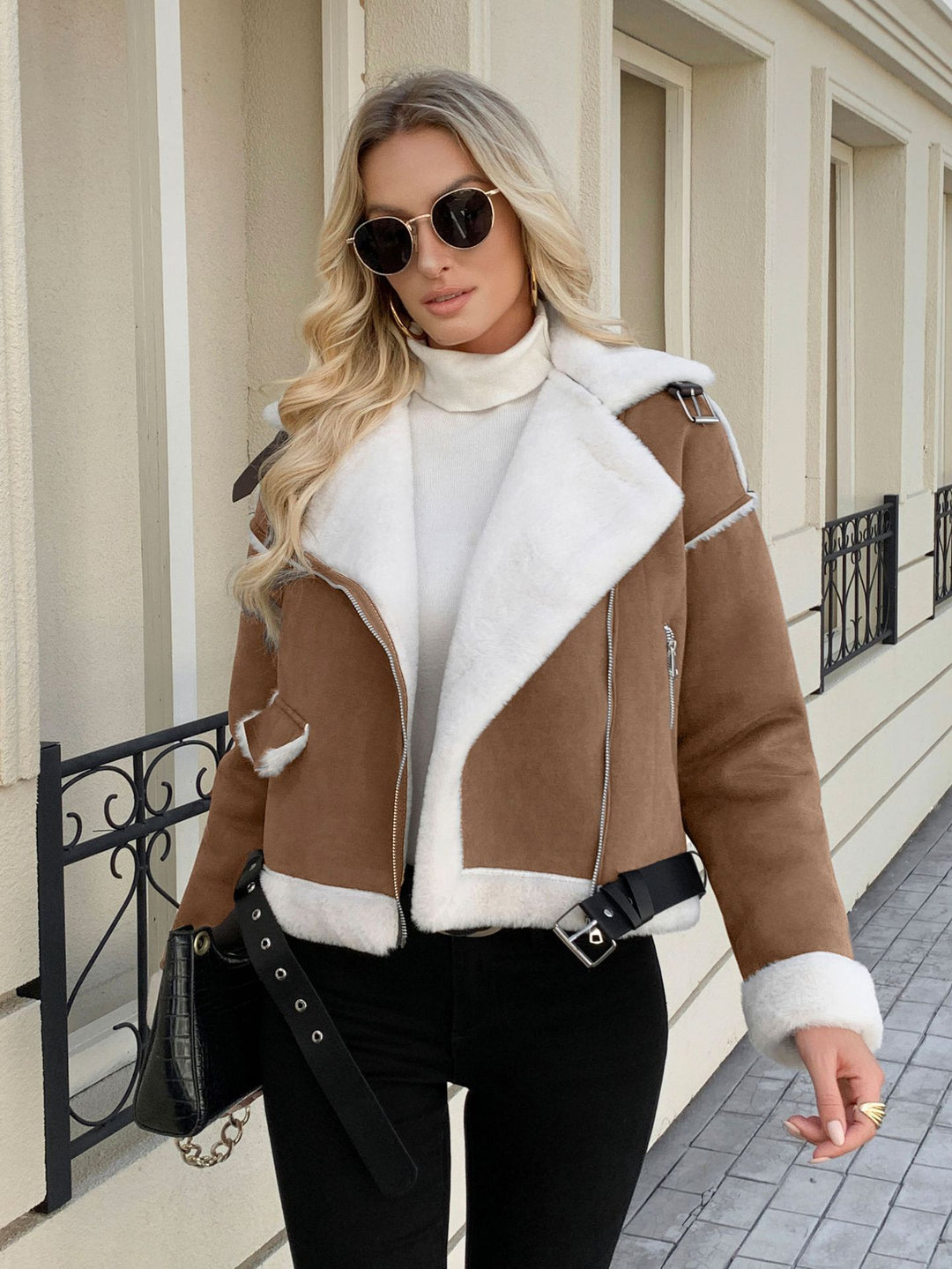 Trendy motorcycle jacket for women with faux leather details and a warm faux fur lining Lune London