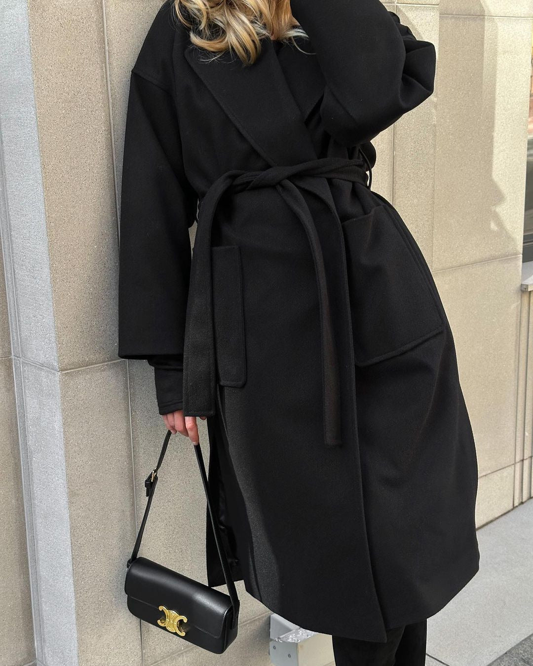 Elegant transitional coat for women with wide lapels and belt detail Lune London