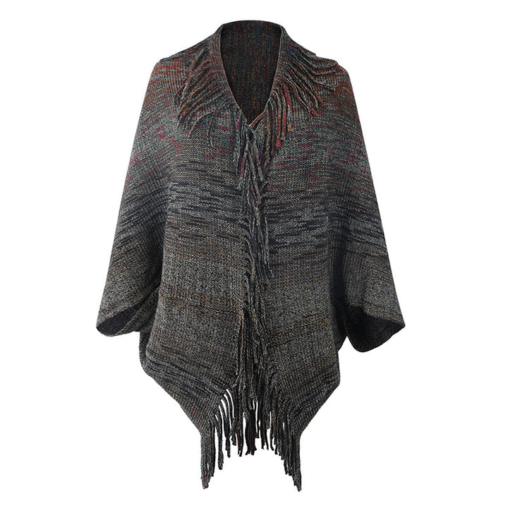 Trendy women's poncho with fringed hem and structured design Lune London