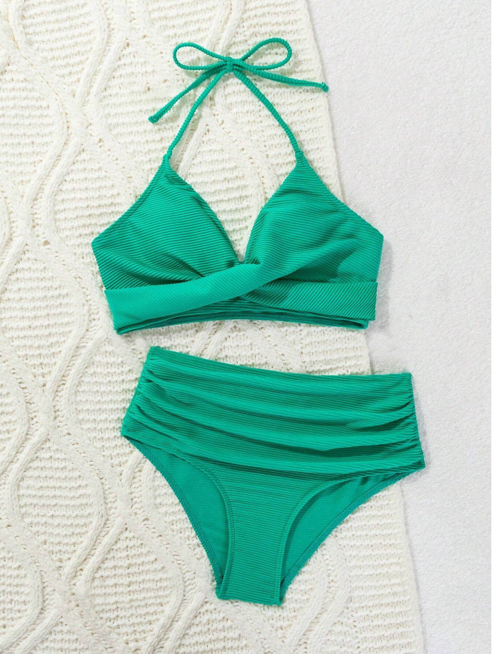 High-waisted women's bikini with an elegant draped top and a playful design Lune London