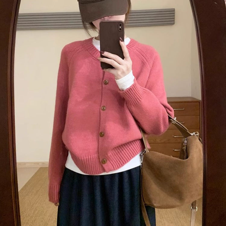 Comfortable knit sweater for women with button details and dropped shoulders Lune London