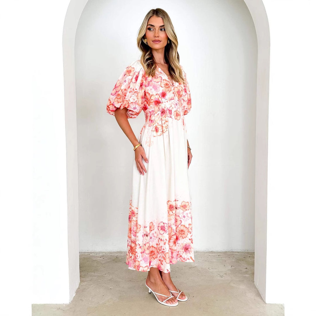Maxi dress for women with voluminous puff sleeves and floral design Chic & Stil