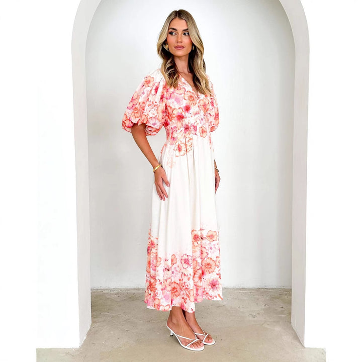 Maxi dress for women with voluminous puff sleeves and floral design Chic & Stil