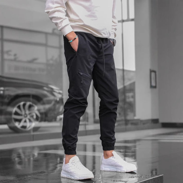 Sport suit trousers for men with elastic waistband and zip pockets on the sides Lune London
