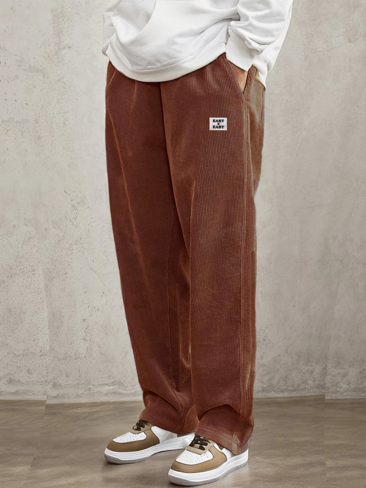 Women's wide corduroy trousers with elastic waistband and side pockets Chic & Stil