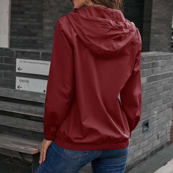 Ladies lightweight transition jacket with trendy hood design and practical pockets Lune London