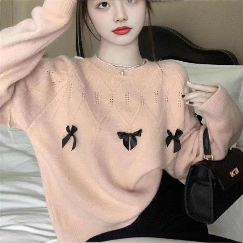 Pull confortable pour femmes avec des appliqués en nœud ludiques Chic & Stil