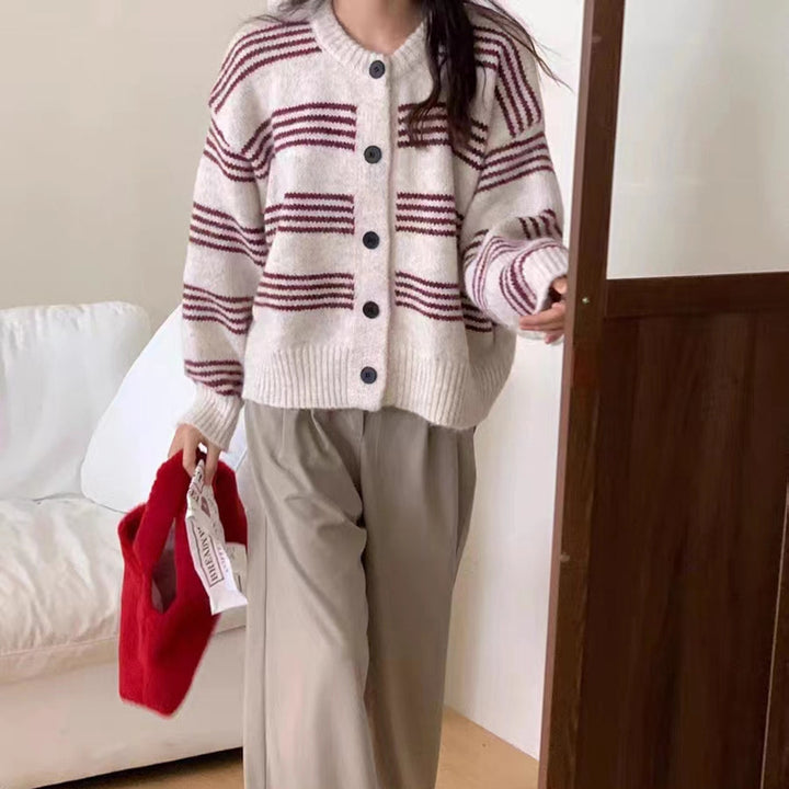 Fashionable knit jacket for women with a fine striped texture and decorative buttons Lune London