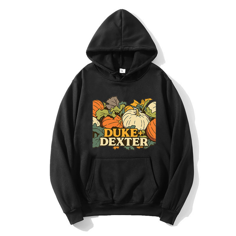 Women's hoodie with cheerful pumpkin motif Chic & Stil