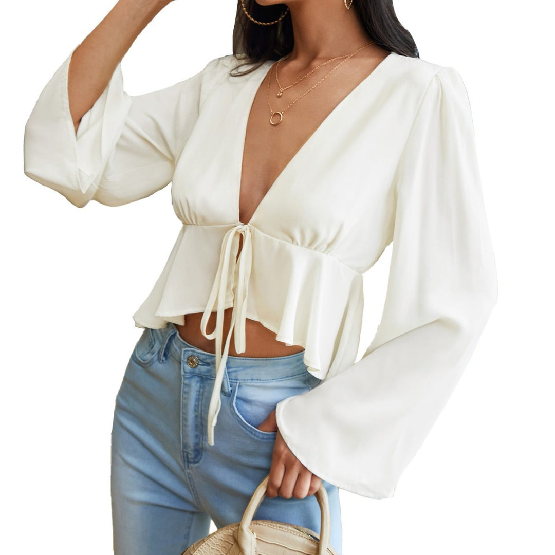 Elegant blouse for women with a deep V neckline and tying details Chic & Stil
