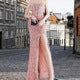 Women's glamorous evening dress with off-shoulder design and shimmering sequins Lune London