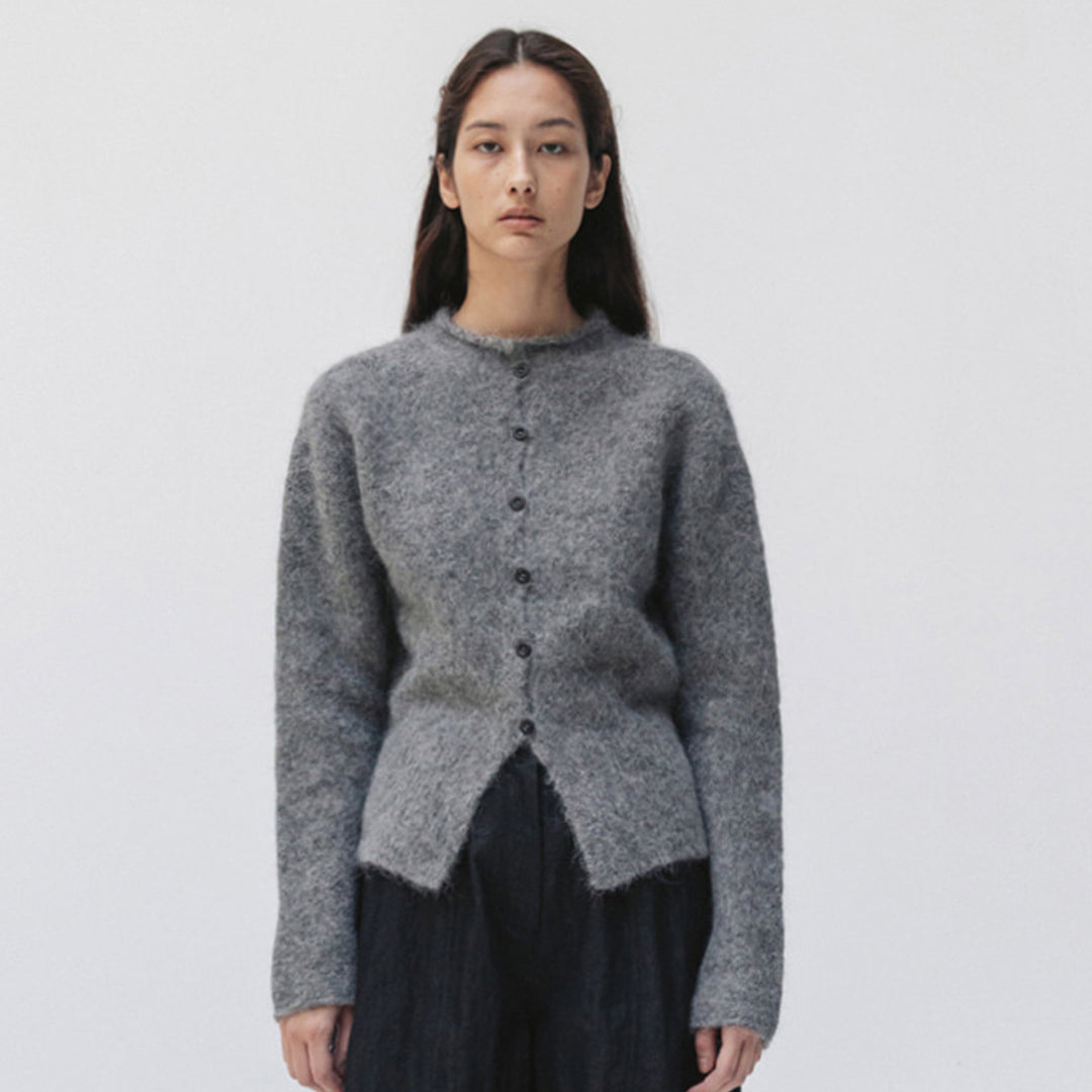 Veste en tricot élégante et chaude pour femmes avec patte de boutonnage Chic & Stil