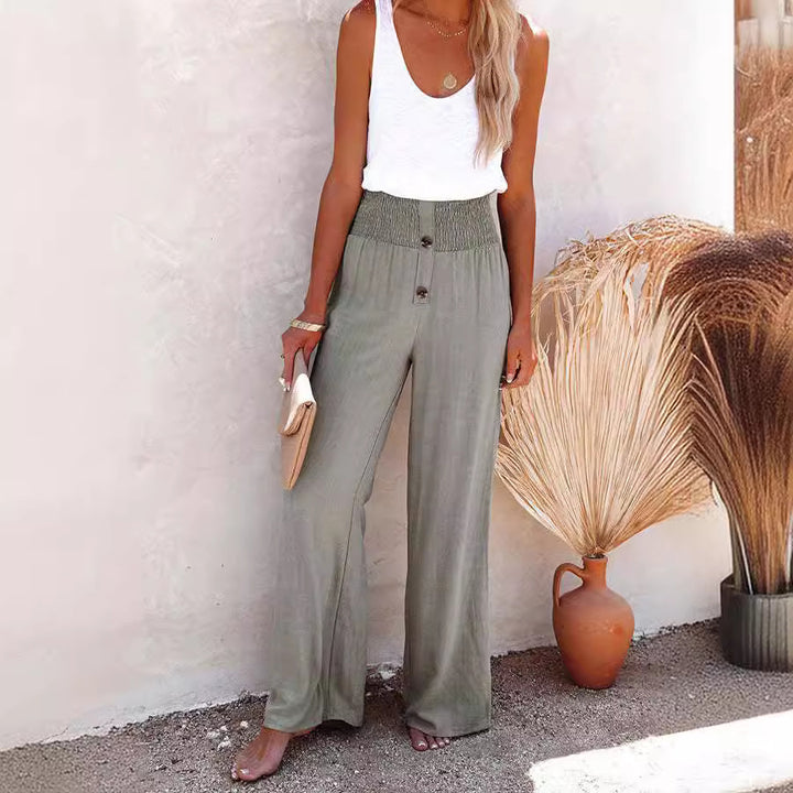 Women's wide-leg linen pants with elastic waistband and button details Lune London