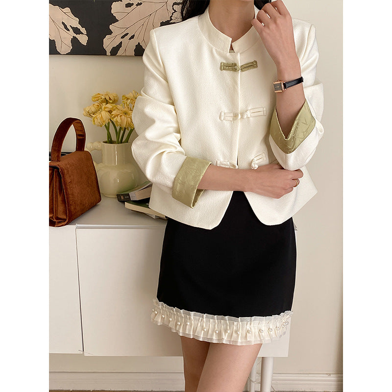 Women's elegant short jacket with decorative buttons Chic & Stil
