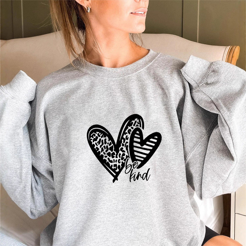 Sweat-shirt femme avec motif de cœur à la mode et coupe décontractée Chic & Stil