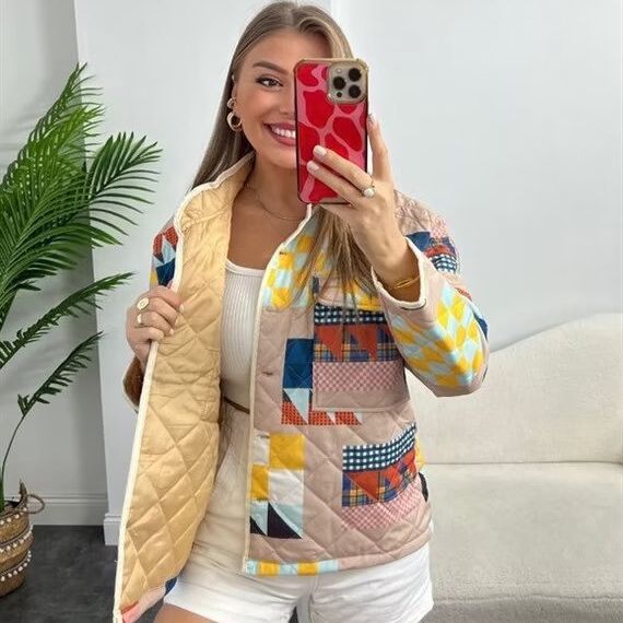Quilted transitional jacket for women with a colorful patchwork pattern and large pockets Lune London